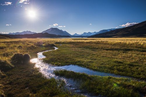 Argentina Travel Landscape Photography Andes Mountain Range seen from marsh land in Perito Moreno National Park Parque Nacional Perito Moreno Santa Cruz Province Argentinian Patagonia Argentina South America