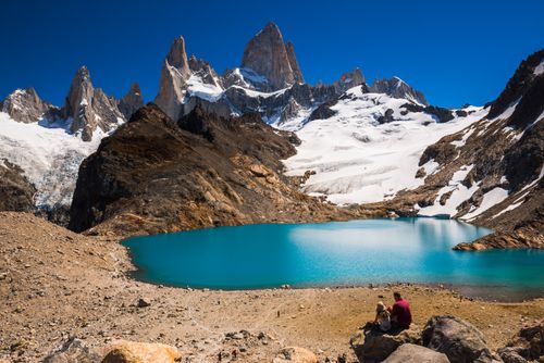Argentina Travel Landscape Photography Hikers at Lago de los Tres with Mount Fitz Roy aka Cerro Chalten behind El Chalten Patagonia Argentina South America