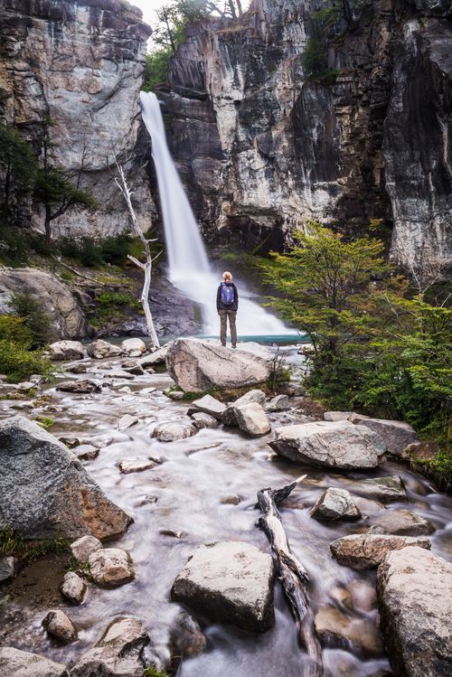 Argentina Travel Landscape Photography Tourist at El Chorrillo waterfall Salto El Chorrillo El Chalten Patagonia Argentina South America