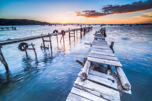 Bolivia Travel Landscape Photography Lake Titicaca pier at sunset Copacabana Bolivia South America