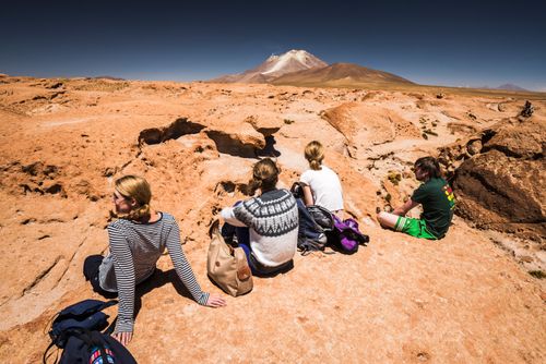 Bolivia Travel Landscape Photography Tourists at Chiguana Desert part of a 3 day tour across the Altiplano of Bolivia South America
