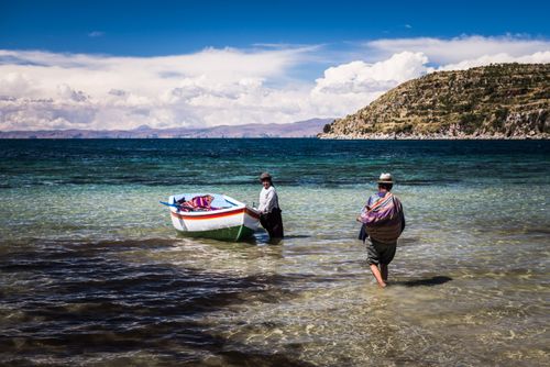 Bolivia Travel Landscape Photography Villagers going fishing on Lake Titicaca at Challapampa village Isla del Sol Island of the Sun Bolivia South America
