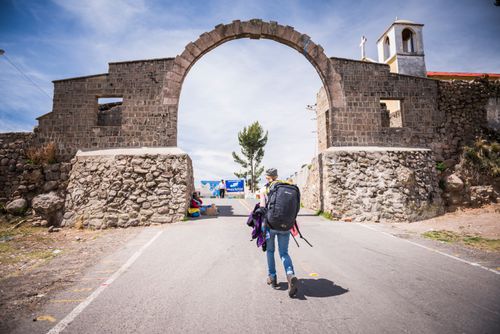 Bolivia Travel Landscape Photography Walking across the Peru Bolivia border crossing at Lake Titicaca from Puno in Peru to Copacabana in Bolivia South America