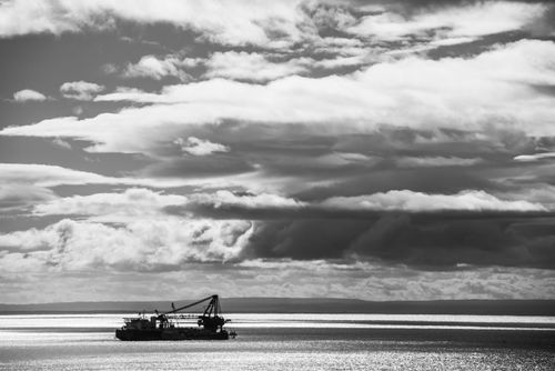 Chile Travel Landscape Photography Industrial ship in Punta Arenas port Magallanes and Antartica Chilena Region Chilean Patagonia Chile South America
