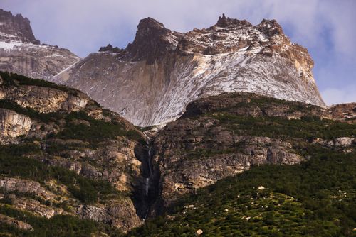 Chile Travel Landscape Photography Los Cuernos and a waterfall in Torres del Paine National Park Parque Nacional Torres del Paine Patagonia Chile South America