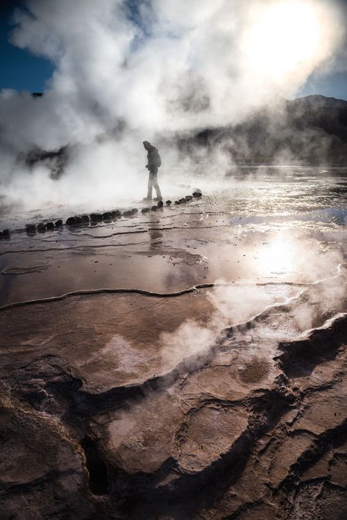 Chile Travel Landscape Photography Tourist at El Tatio Geysers Geysers del Tatio the largest geyser field in the Southern Hemisphere Atacama Desert North Chile South America