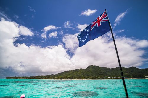 Cook Islands Landscape Travel Photography Rarotonga and the Cook Islands flag seen from Muri Lagoon Rarotonga Cook Islands