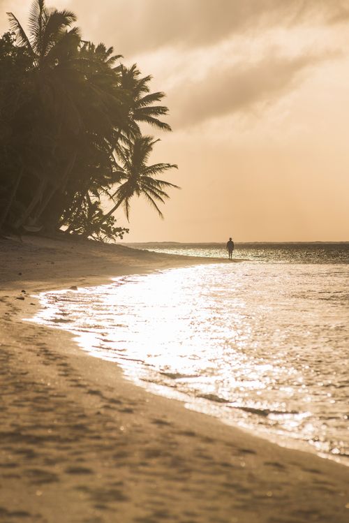 Cook Islands Landscape Travel Photography Walking along a tropical beach at sunrise Titikaveka Rarotonga Cook Islands