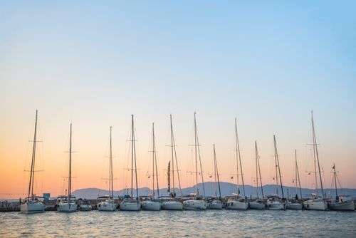 Greece Travel Photography Sailing boats at sunset on Agistri Island Saronic Islands Greece