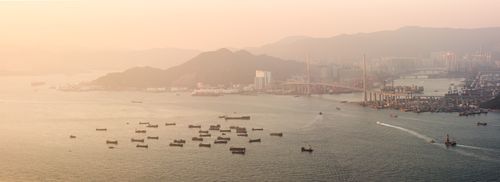 Hong Kong Travel Photography Boats in Victoria Harbour at sunset seen from Victoria Peak Hong Kong Island Hong Kong China