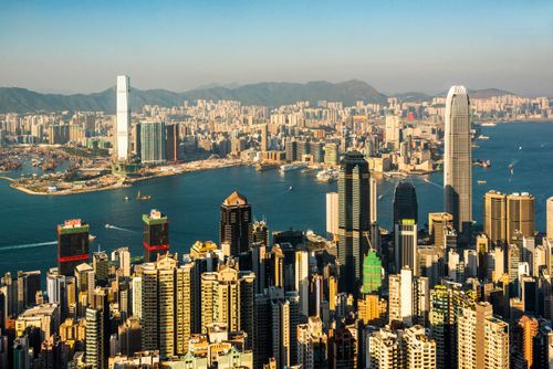 Hong Kong Travel Photography View across Victoria Harbour from Hong Kong Island to Kowloon seen from Victoria Peak China