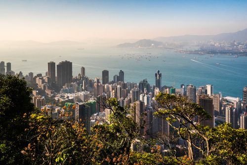 Hong Kong Travel Photography View over Victoria Harbour at sunset seen from Victoria Peak Hong Kong Island Hong Kong China