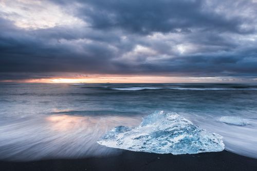 Iceland Landscape Photography Iceberg at sunrise on Jokulsarlon Beach a black volcanic sand beach in South East Iceland 2