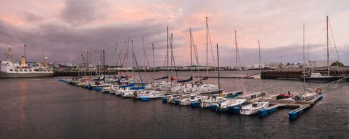 Iceland Travel Photography Boats in Reykjavik Harbour at sunrise Iceland