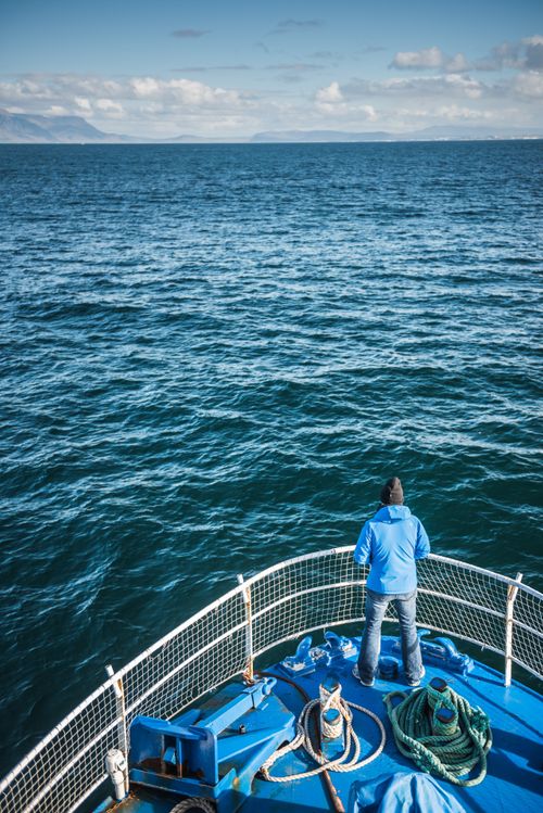 Iceland Travel Photography Tourists on a whale watching boat Reykjavik Iceland Europe