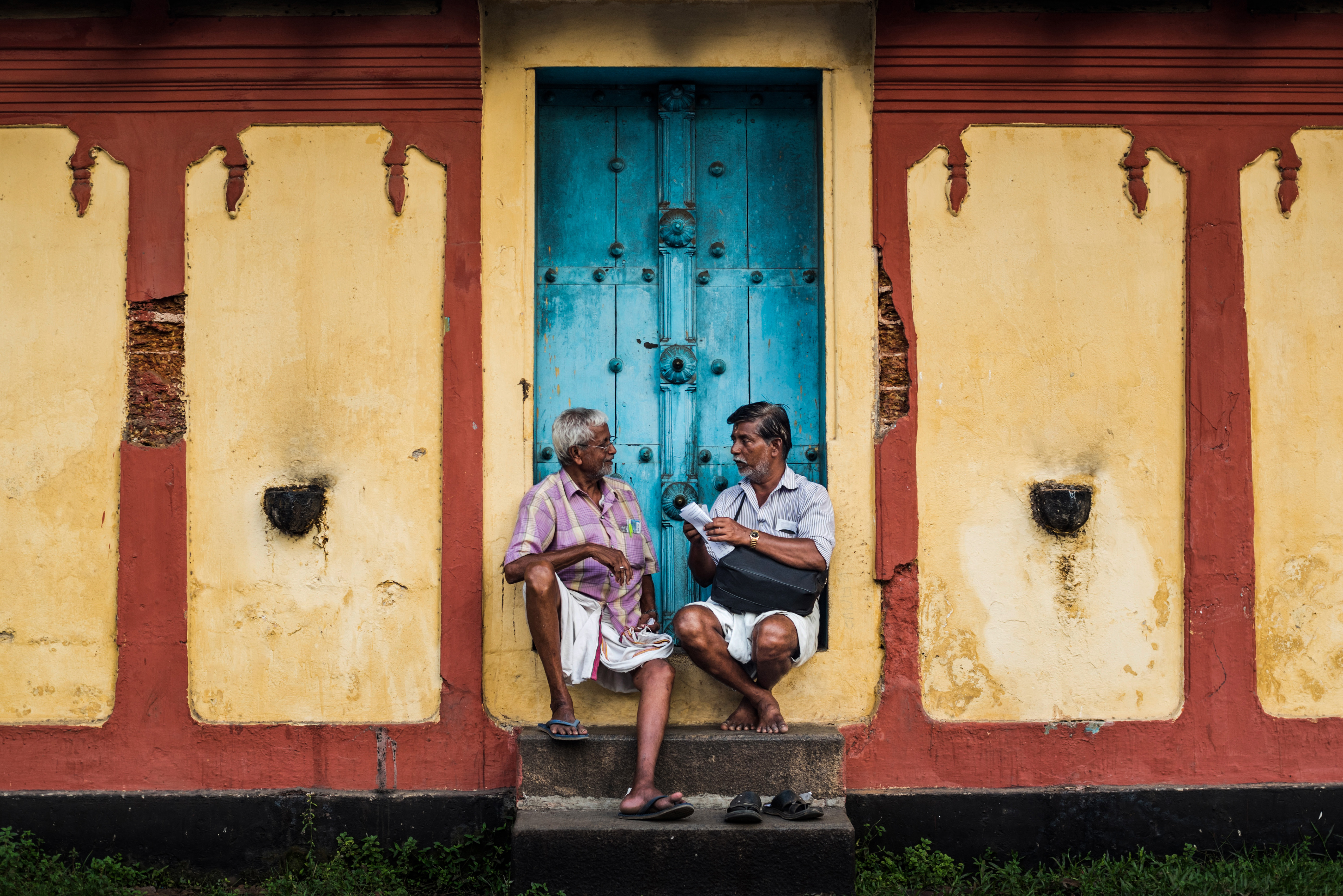 India Travel Street Photography Indian street scene outside a temple Fort Kochi Cochin Kerala India