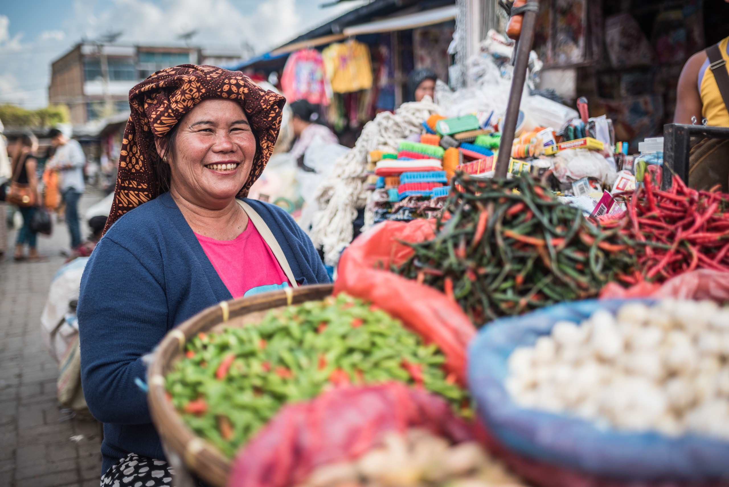 Indonesia Travel Portrait Photography Portrait of a market stall owner in Berastagi Brastagi Market North Sumatra Indonesia Asia