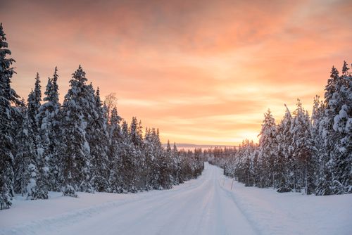 Lapland Finland Landscape Photography Bad driving conditions on dangerous icy roads in slippery ice and snow covered cold weather winter scenery in Lapland Finland Europe