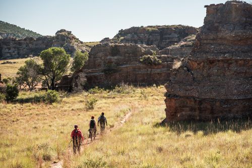 Madagascar Adventure Travel Photography Tourists hiking in Isalo National Park Ihorombe Region Southwest Madagascar