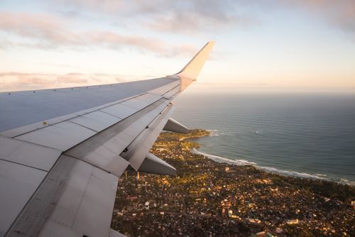 Madagascar Travel Photography View of airplane wing at sunset Madagascar Africa