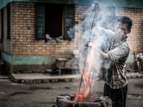 Madagascar Travel Portraiture Portrait Photography Making aluminium near Ambatolampy in the Central Highlands of Madagascar