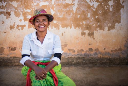Madagascar Travel Portraiture Portrait Photography Portrait of lady in traditional Malagassy clothes Ambohimahasoa Madagascar Central Highlands