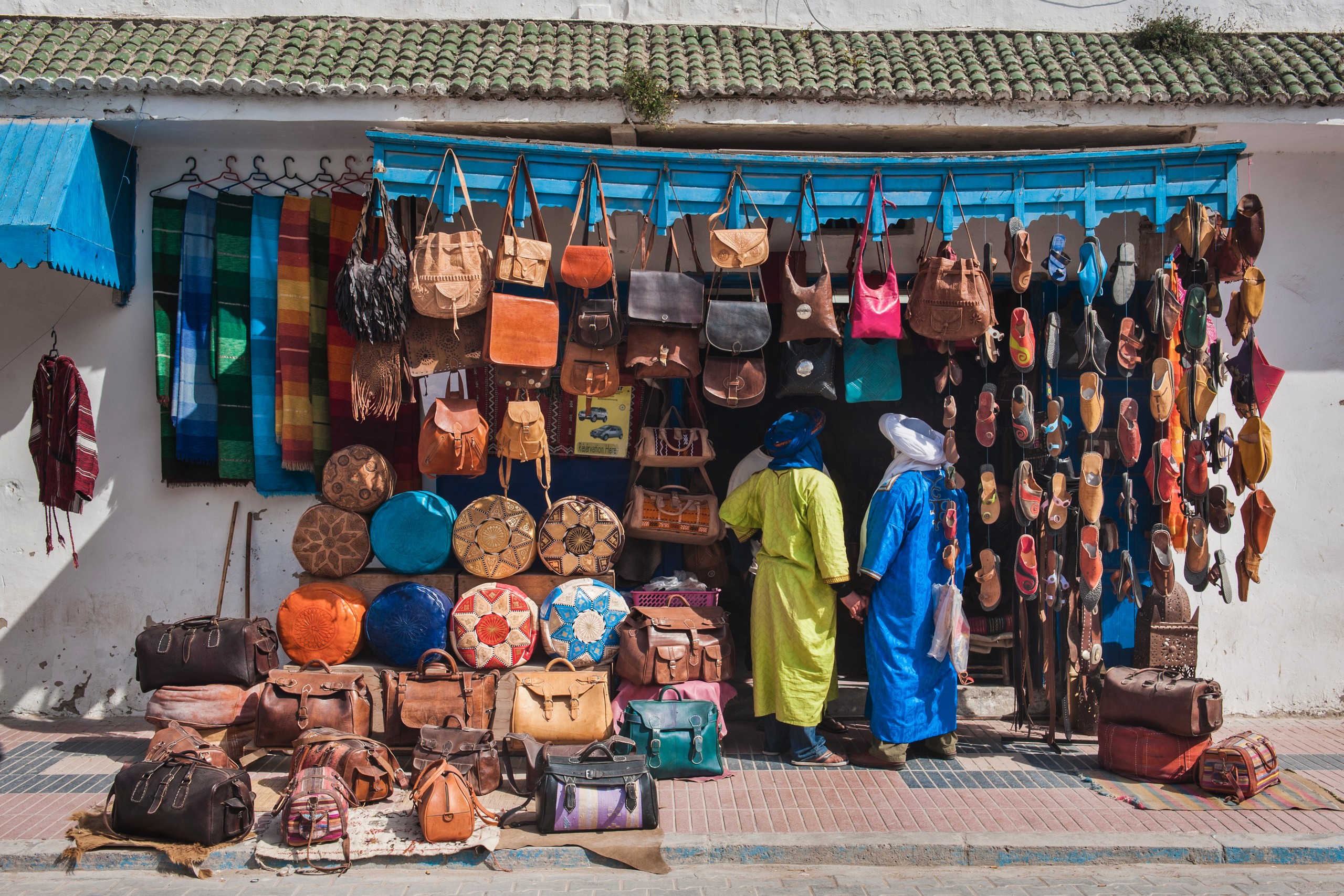 Morocco Travel Photography Berber men shopping Essaouira formerly Mogador UNESCO World Heritage Site Morocco Africa