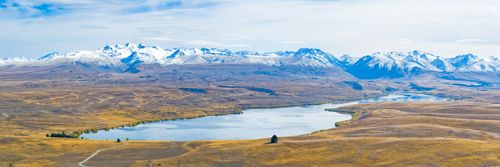 New Zealand Landscape Photography Panoramic Photo of Lake Alexandrina and Snow Capped Mountains in South Island New Zealand