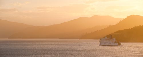 New Zealand Travel Photography Panoramic Photo at Sunset of the Interislander Ferry Between Picton South Island and Wellington North Island New Zealand