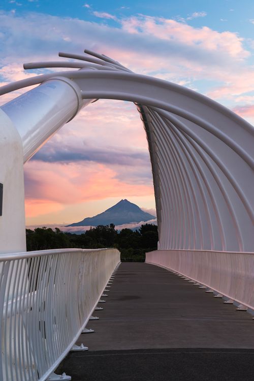 New Zealand Landscape Architecture Photography Te Rewa Rewa Bridge at sunset with Mount Taranaki Mount Egmont behind Taranaki Region North Island New Zealand 2