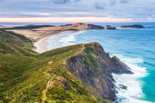 New Zealand Landscape Photography Te Werahi Beach at sunrise with Te Paki Coastal Track path visible Cape Reinga New Zealand