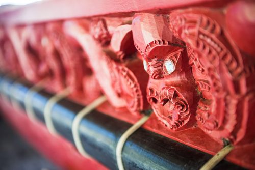 New Zealand Travel Photography Wooden carving details on a Maori War Canoe Waitangi Treaty Grounds Bay of Islands North Island New Zealand