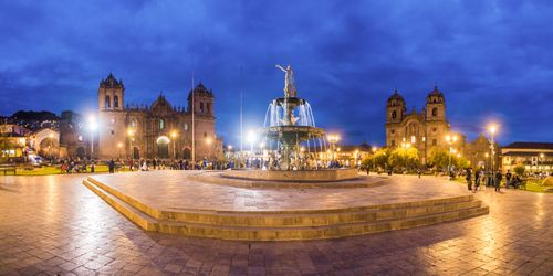 Peru Architecture Travel Photography Plaza de Armas Fountain Cusco Cathedral and Church of the Society of Jesus at night Cusco Peru South America