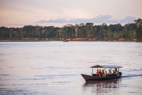 Peru Travel Photography Amazon Jungle boat trip at sunset Tambopata National Reserve Peru South America