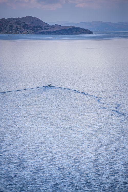 Peru Travel Photography Boat tour on Lake Titicaca seen from Taquile Island Peru South America