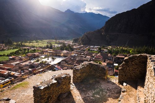 Peru Travel Photography Pinkullyuna Inca Storehouses at sunset above Ollantaytambo Sacred Valley of the Incas near Cusco Peru South America