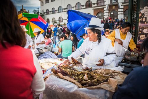 Peru Travel Photography Pork food stall Saturday Market Cusco Cusco Region Peru South America
