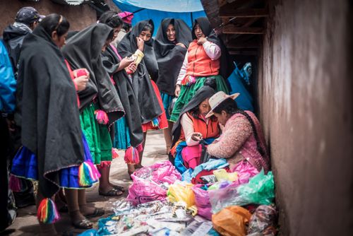 Peru Travel Photography Traditional Peruvian Quechua women at Taquile Market on Taquile Island Lake Titicaca Peru South America