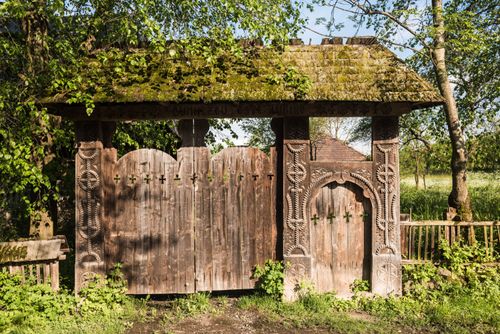 Romania Travel Photography Traditional Romanian wooden decorated gate found in the Maramures and Transylvania Regions Breb Brebre Romania