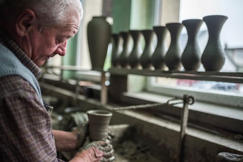 Romania Travel Portrait Photography Documentary Portraiture Man making Marginea Black Pottery Black Ceramics of Marginea Bukovina Romania