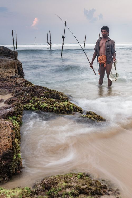 Sri Lanka Portrait Travel Photography Portrait of a stilt fisherman at Midigama near Weligama South Coast Sri Lanka Asia