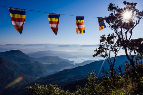 Sri Lanka Travel Photography Adams Peak Sri Pada misty mountain view with Buddhist flags Central Highlands of Sri Lanka Asia