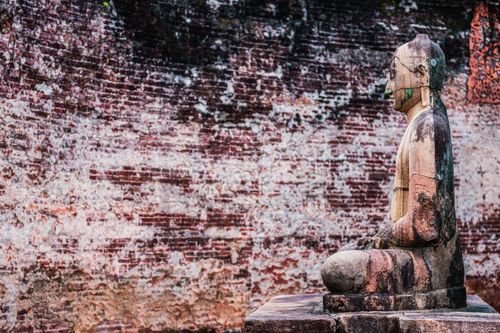 Sri Lanka Travel Photography Ancient City of Polonnaruwa stone Buddha statue at Vatadage Circular Relic House in Polonnaruwa Quadrangle UNESCO World Heritage Site Sri Lanka Asia