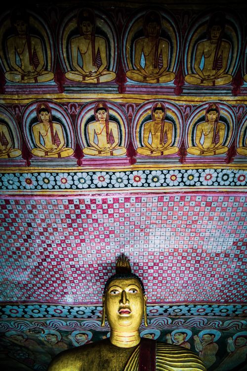 Sri Lanka Travel Photography Dambulla Cave Temples Buddha and wall painting in cave 2 Cave of the Great Kings UNESCO World Heritage Site Dambulla Sri Lanka Asia