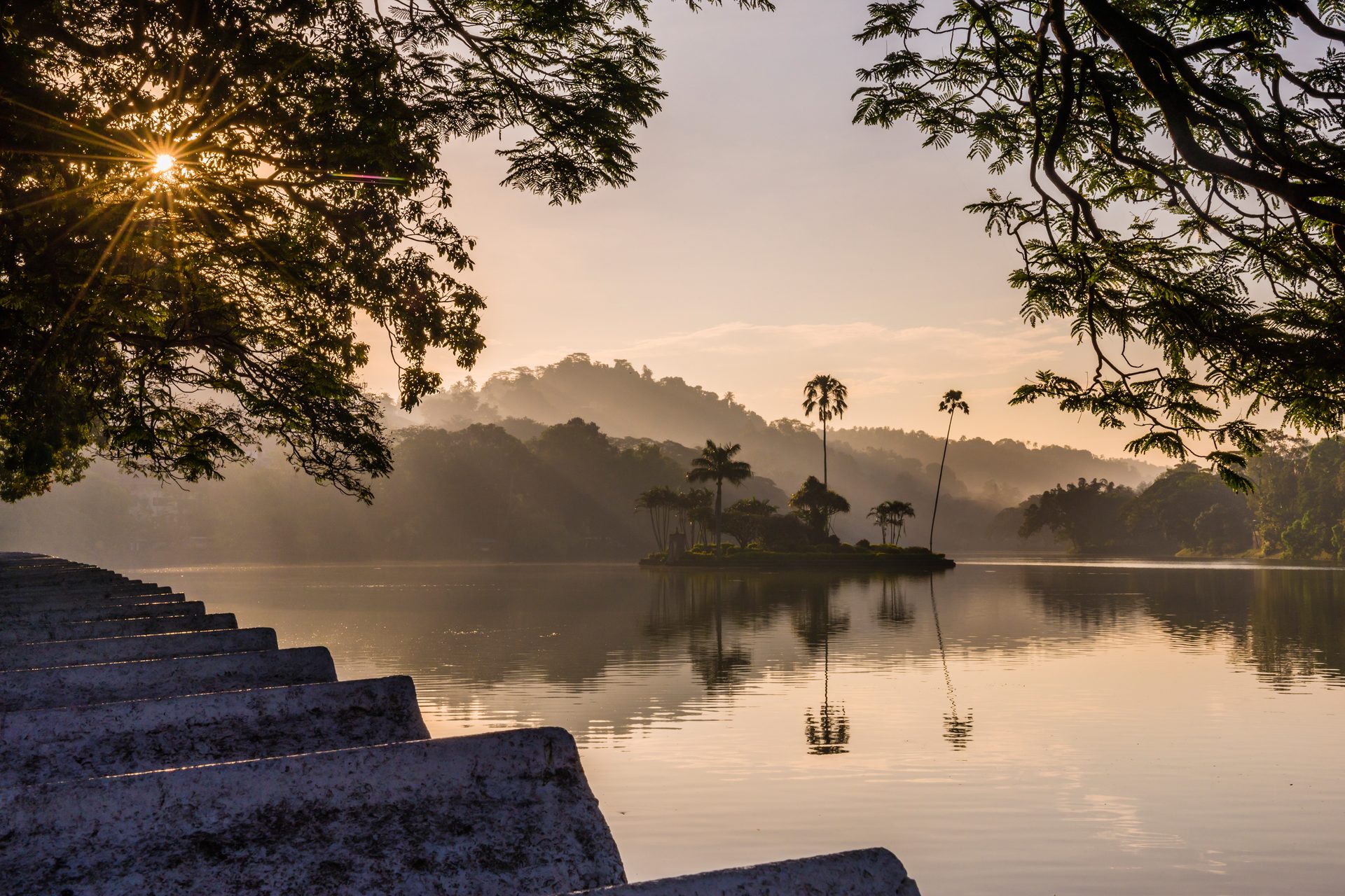 Sri Lanka Travel Photography Kandy Lake and the island which houses the Royal Summer House at sunrise Kandy Central Province Sri Lanka Asia