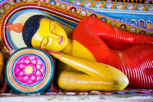 Sri Lanka Travel Photography Sacred City of Anuradhapura colourful Buddhist Buddha statues at Isurumuniya Vihara UNESCO World Heritage Site Cultural Triangle Sri Lanka Asia