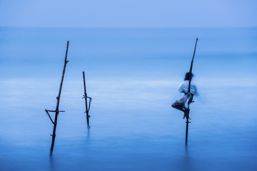 Sri Lanka Travel Photography Stilt fisherman fishing at Midigama near Weligama South Coast Sri Lanka Asia 2