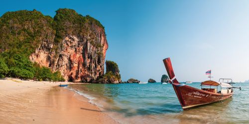 Thailand Beach Travel Landscape Photography Panoramic Photo of a Traditional Thai Boat on Tropical Ao Phra Nang Beach Railay Rai Leh South Thailand Southeast Asia