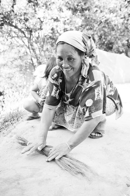 Thailand Documentary Travel Photography Black and White Photo of a Thai Woman Hand Making Brooms Chiang Rai Thailand Southeast Asia