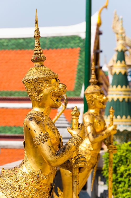 Thailand Travel Photography The Grand Palace two gold guardian statues Bangkok Thailand Southeast Asia Asia Southeast Asia